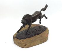 Bronze model of a Running Horse, raised on a polished stone plinth base, marked  Annette 73 , base 9