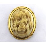 19th Century Gold framed carved Ivory Brooch depicting a Chinese Emperor with followers in a