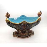 Oval Majolica centre bowl, the body decorated with Mermaid shaped handles, Lion mask detail and