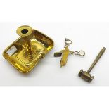 A 19th Century Brass Chamber Stick of rectangular form, complete with scissor shaped Snuffers