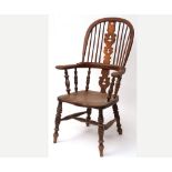 19th Century Elm seated stick back Carver Chair with central pierced splat, raised on turned legs