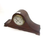 First half of 20th Century Mahogany cased Mantel Clock, the arched case with splayed feet to a