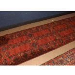 20th Century Caucasian style wool runner, decorated with an all over panelled geometric design on