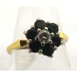 Early/Mid-20th Century high grade precious metal flowerhead design ring, featuring a centre small