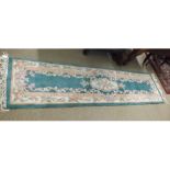 A Chinese Thick Pile Wool Runner, single gul border, central lozenge, puce, pale green and beige