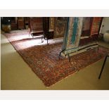 Large Caucasian style wool carpet with multi gold border, central panel of geometric foliage (