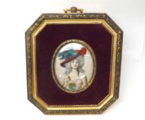 A small Framed Miniature Study of a classically dressed female figure, in an octagonal brass and