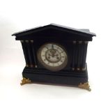 Early 20th Century Ebonised Mantel Clock, the architectural case with Palladian pediment over six