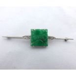 Good early/mid-20th Century precious metal Bar Brooch, featuring a centre square carved Jade panel