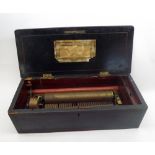 A late 19th Century Swiss Ebonised Rosewood and Boxwood Inlaid Music Box, of typical rectangular