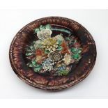 Unusual Portuguese wall Plate by Jose a Cunha, the centre decorated with raised floral detail, 12