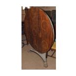 Georgian Rosewood pedestal Dining Table, the round top with Brass inlaid plate rings, raised on a