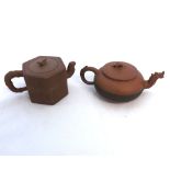 Two Chinese Redware Pottery Teapots, one of hexagonal form, the other of compressed circular