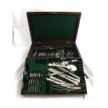 An Oak Cased Composite Cutlery Set with pull-out interior tray, vacant cartouche to lid