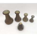 A Graduated Set of four Avery Brass Bell Weights from 7lb to 1lb, together with a further