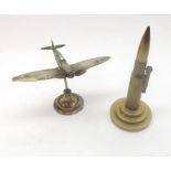 A Mixed Lot comprising: a small Brass Spitfire Model and a further Vintage Table Lighter formed as a
