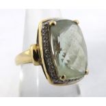 Hallmarked 9ct Gold modern large pale green stone and small Diamond surround Dress Ring