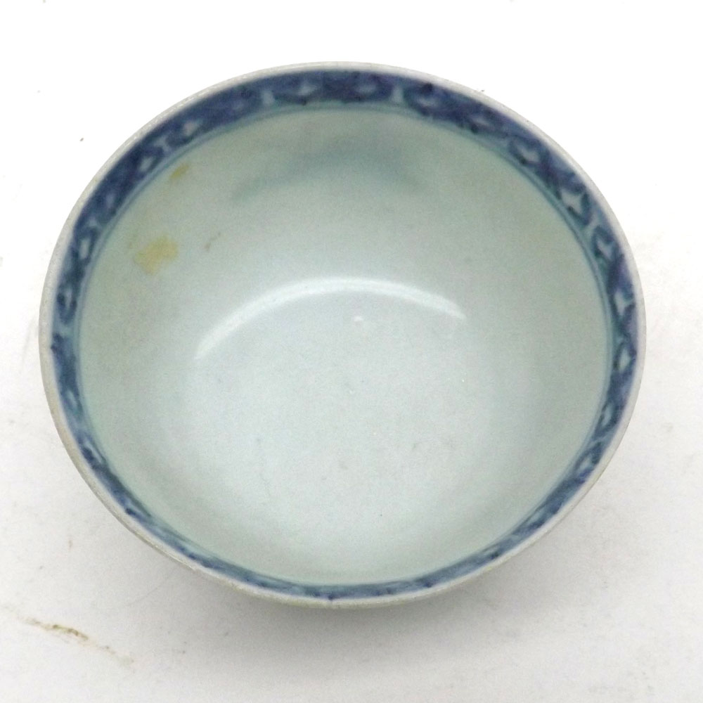 A Nankin Cargo Tea Bowl and Saucer, typically decorated in underglaze blue with Chinese river scene, - Image 3 of 7