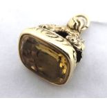 Good quality Victorian Gold encased Seal of shaped rectangular design having foliate chased