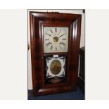 Late 19th Century American 30 hour weight driven Wall Clock, the rectangular cushion moulded case