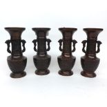 Set of four Chinese Bronze Patinated Baluster Vases embossed with panels of dragons etc, 5 >  high