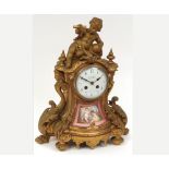 Early 20th Century figural gilt Spelter and porcelain Mantel Clock retailed by Morath Bros