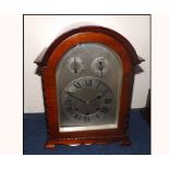 Mid-20th Century Mahogany cased triple barrel Mantel Clock, the arched case to a single glazed and