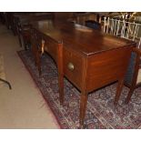 19th Century Mahogany break front Sideboard, with two doors and single drawer raised on tapering