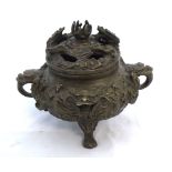 A Chinese Bronze Patinated Koro, of two-handled compressed baluster form, the pierced cover and body