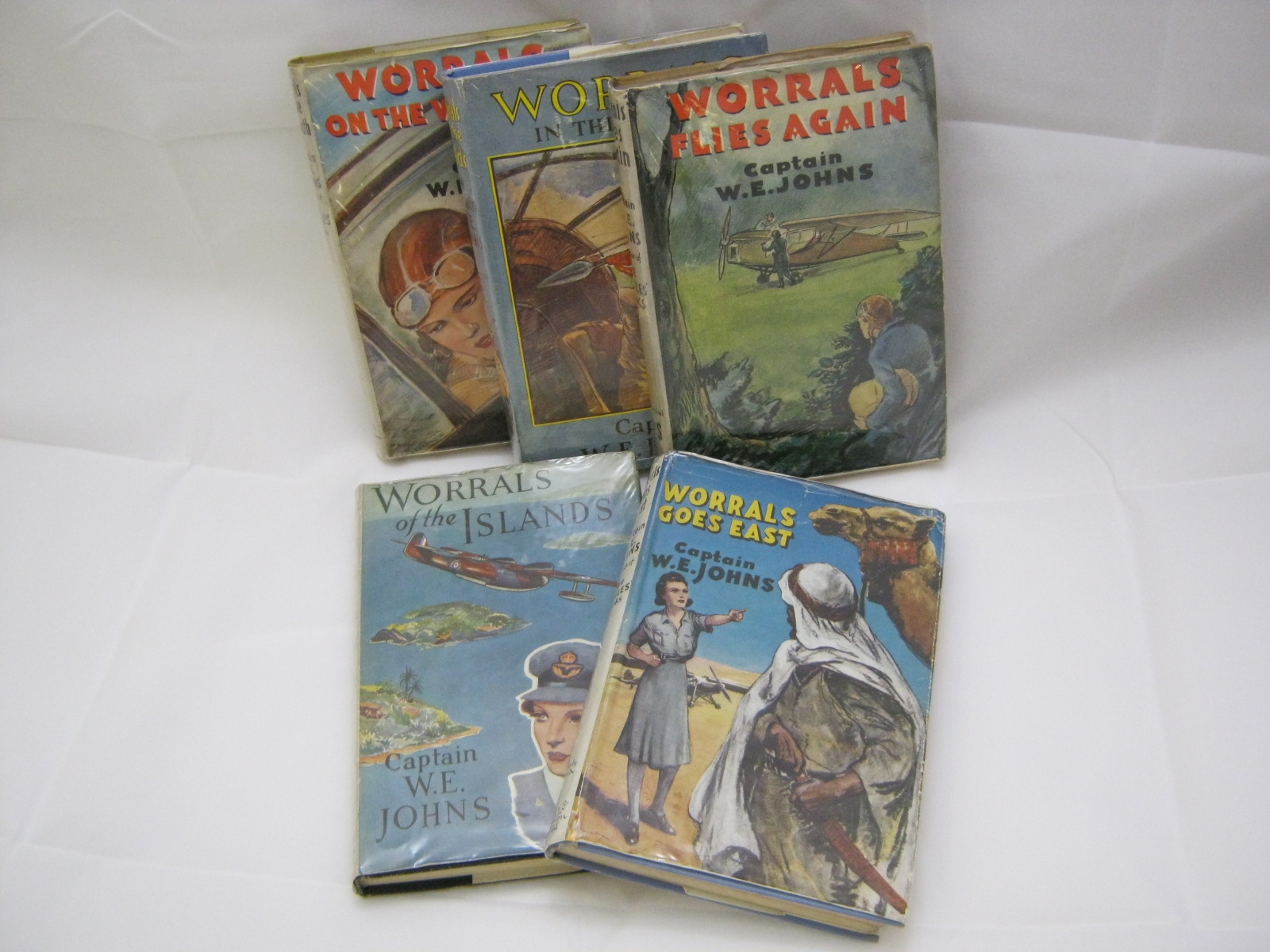 W E JOHNS, 5 ttls: WORRALS GOES EAST, 1944, 1st edn, orig cl, d/w; WORRALS FLIES AGAIN, 1948, 3rd