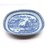 A Nanking Dish of oval form, the centre typically decorated in underglaze blue with a Chinese