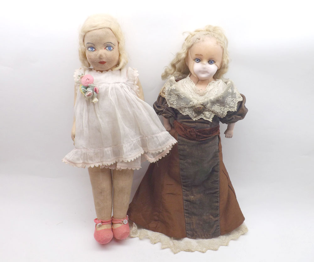 A Chad Valley Felt Face and Cloth Body Doll; together with a Wax Over Composition Doll, with fixed
