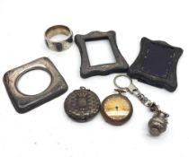 A Mixed Lot comprising: a pair of Miniature Hallmarked Silver Mounted Photograph Frames,