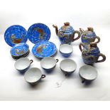 Japanese Eggshell tea service, the teapot, two handled covered sugar bowl and hot water jug all with