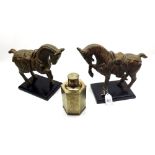 Pair of painted/patinated gilt metal models of Tang type ceremonial horses on integral stands,