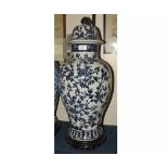 Large Oriental covered Baluster Vase decorated in blue/black with birds and flowering foliage on