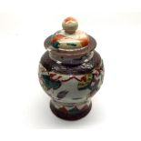 Chinese covered Baluster Vase, decorated in the typical manner in puce Iron red, famille vert with