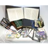 GB collection mainly unmounted mint Machin defins in three albums, two stock books and stock cards