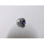 Mid-grade yellow metal centre oval blue Sapphire (approximately 6ct) and multi small Diamond