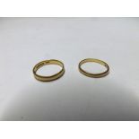 Two hallmarked 22ct Gold Wedding Rings, weighing in total 5 1/2 gms