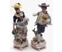 Pair of Sampson figures in the Chelsea manner, models of young male and female figures in period