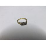 Hallmarked 18ct Gold Engagement Ring set with three small Brilliant Cut Diamonds
