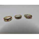 Group comprising an early 20th Century hallmarked 18ct Gold Ring set with a centre Ruby and two