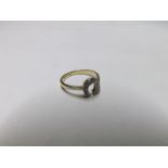 Early 20th Century hallmarked 18ct Gold and Platinum Ring set with a horseshoe shaped front