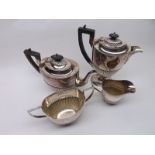 A late 19th or early 20th Century Four Piece Silver Plated Tea Set, comprising teapot, hot water