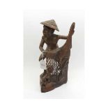 An Oriental Carved Hardwood Study of fisherman, 20th Century, 12" high