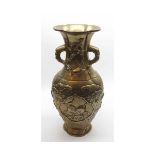 A Chinese Gilded Bronze Large Baluster Vase of two-handled tapering ovoid form, embossed with