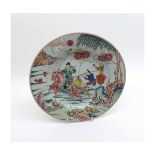 An 18th Century Chinese Plate, the centre painted in colours with a warrior and his apprentice in