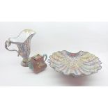 An Oriental Enamel Fan-Shaped Dish, brightly painted in colours with panels of floral designs;