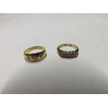 Early 20th Century hallmarked 18ct Gold Ring set with one old cut and two rose cut small Diamonds in
